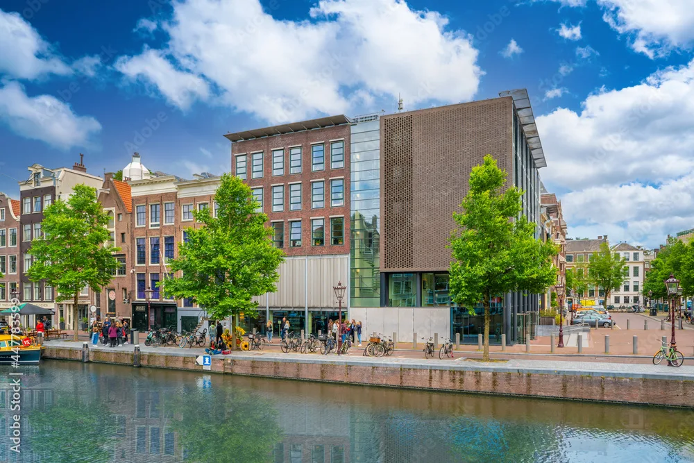 Amsterdam, The Netherlands 23th June 2021 -The ANne Frank house with some tourists waiting to enter during Corona times